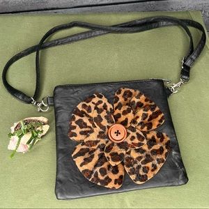 Sax small black shoulder purse with cheetah print flower